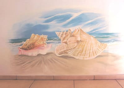 Tropical beach murals in  Over the Water rental homes in Bocas del Toro.